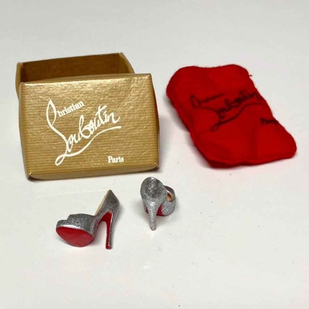 Authentic Christian Louboutin Miniature Shoes (Barbie) with Box and Dustbag.